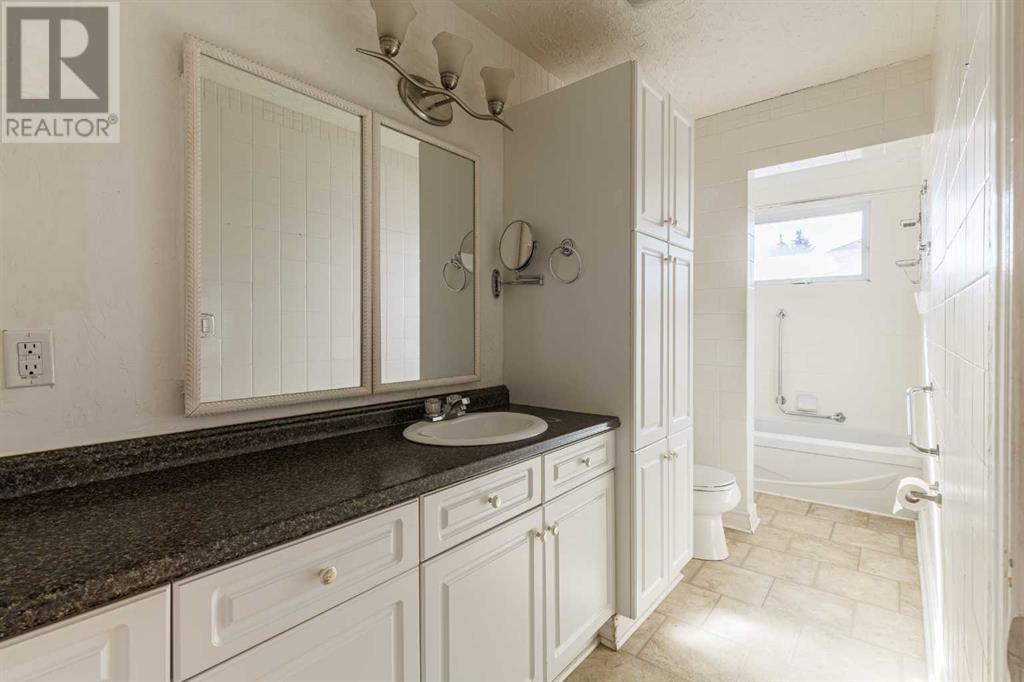 903 Abbotsford Drive Ne, Calgary, Alberta  T2A 5Y3 - Photo 12 - A2200223