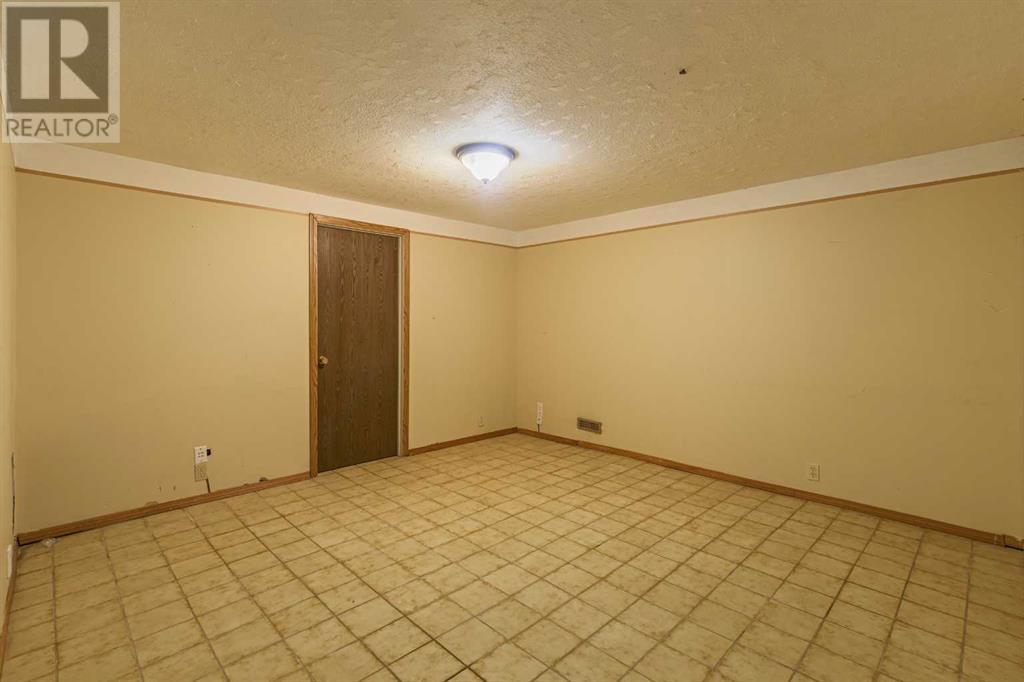 903 Abbotsford Drive Ne, Calgary, Alberta  T2A 5Y3 - Photo 16 - A2200223