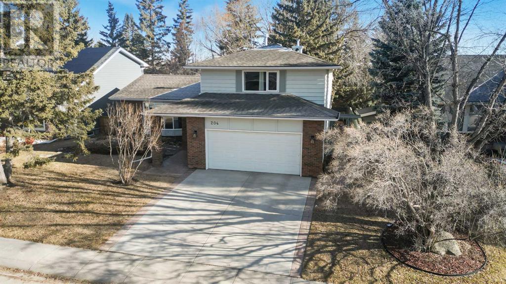 204 Oakside Circle Sw, Calgary, Alberta  T2V 4H2 - Photo 3 - A2204074