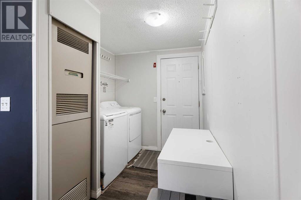 147 Heritage Drive, Okotoks, Alberta  T1S 1P1 - Photo 24 - A2196410