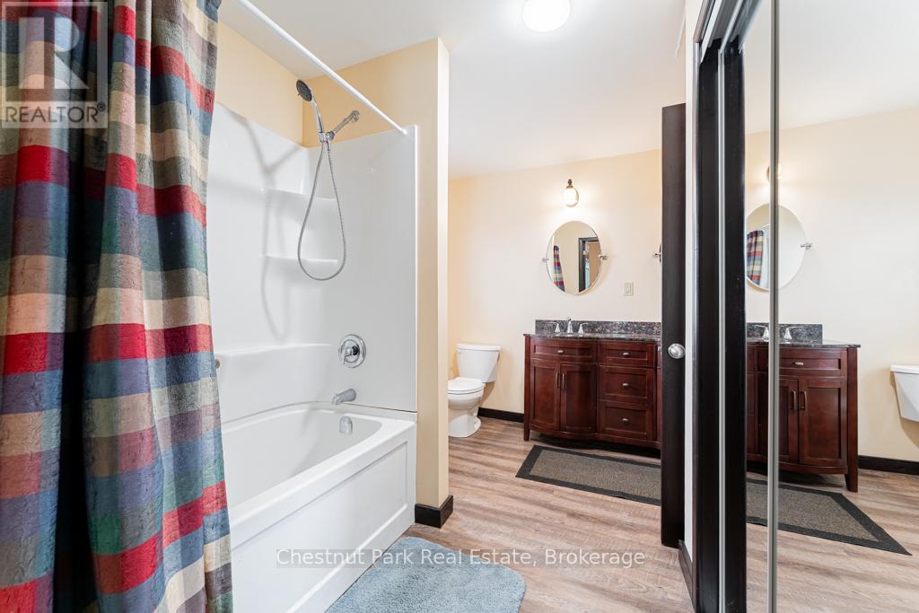 2253 Lone Pine Drive, Huntsville, Ontario  P0B 1L0 - Photo 19 - X12043072