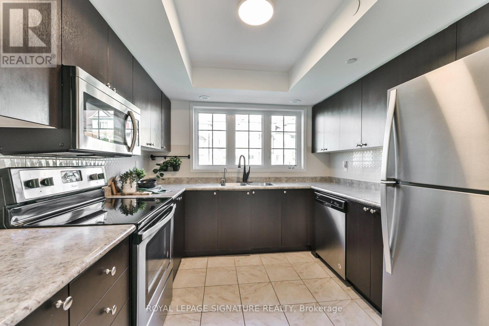 Property at 223 - 2456 ROSEDROP PATH image 5
