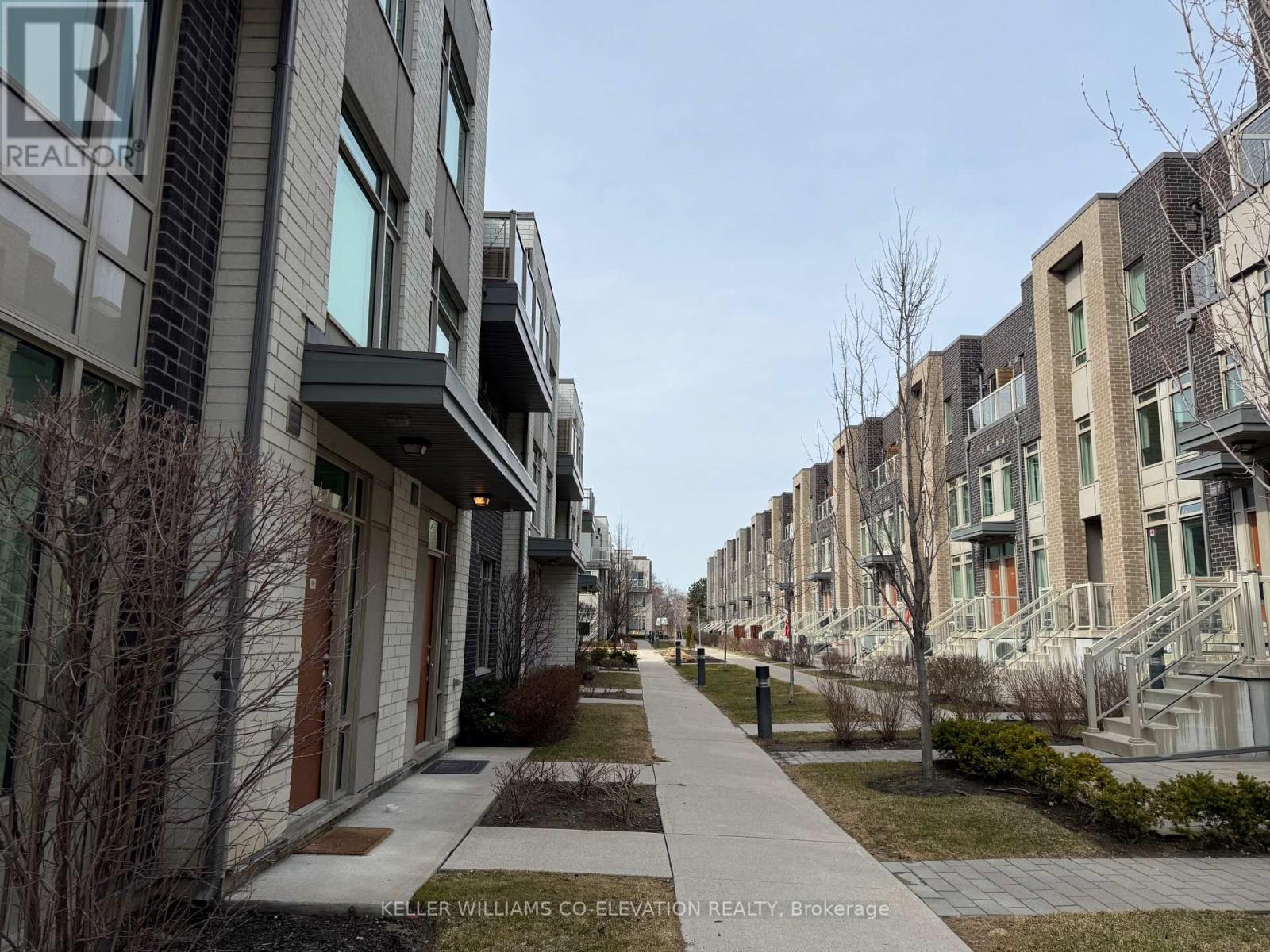 112 - 11 Applewood Lane, Toronto, Ontario  M9C 2Z7 - Photo 2 - W12044183