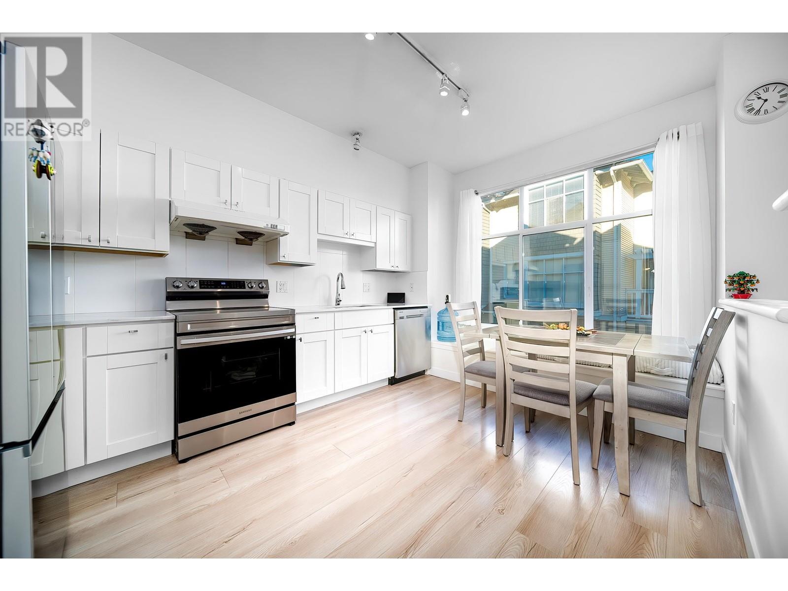 Property at 20 6588 BARNARD DRIVE image 3