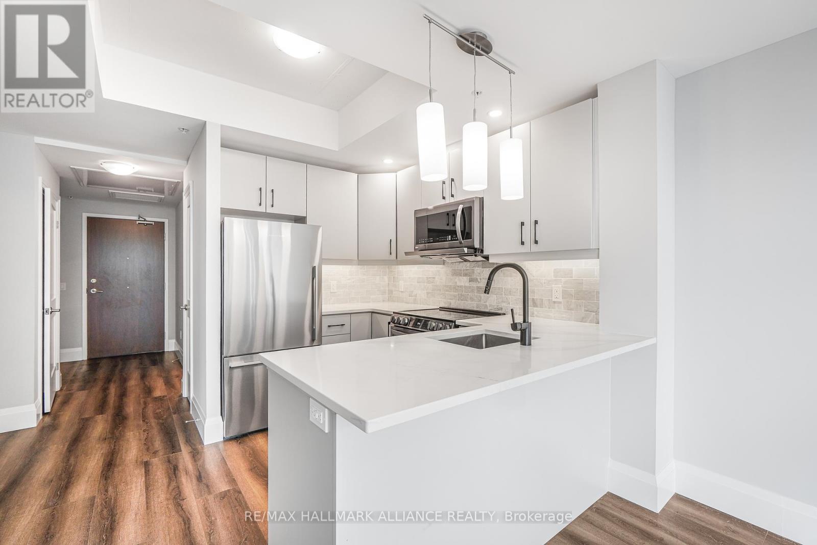 604 - 108 Garment Street, Kitchener, Ontario  N2G 0E2 - Photo 1 - X12044667