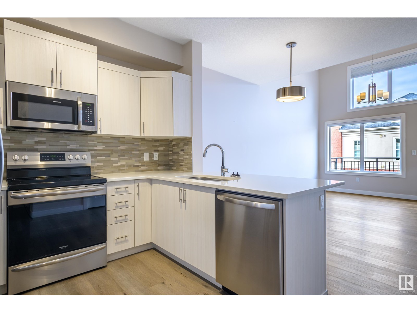 Property at #415 560 GRIESBACH PARADE PR NW image 4