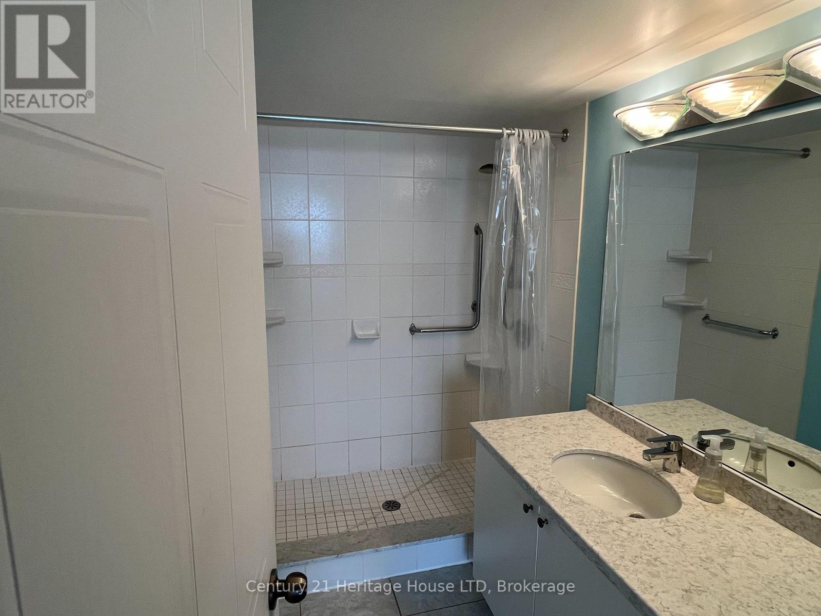 407 - 5100 Dorchester Road, Niagara Falls (Morrison), Ontario  L2E 7H4 - Photo 12 - X12003628