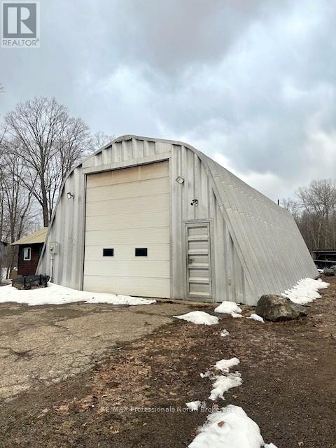 1011 Kc Dam Road, Minden Hills, Ontario  K0M 2K0 - Photo 2 - X12048512