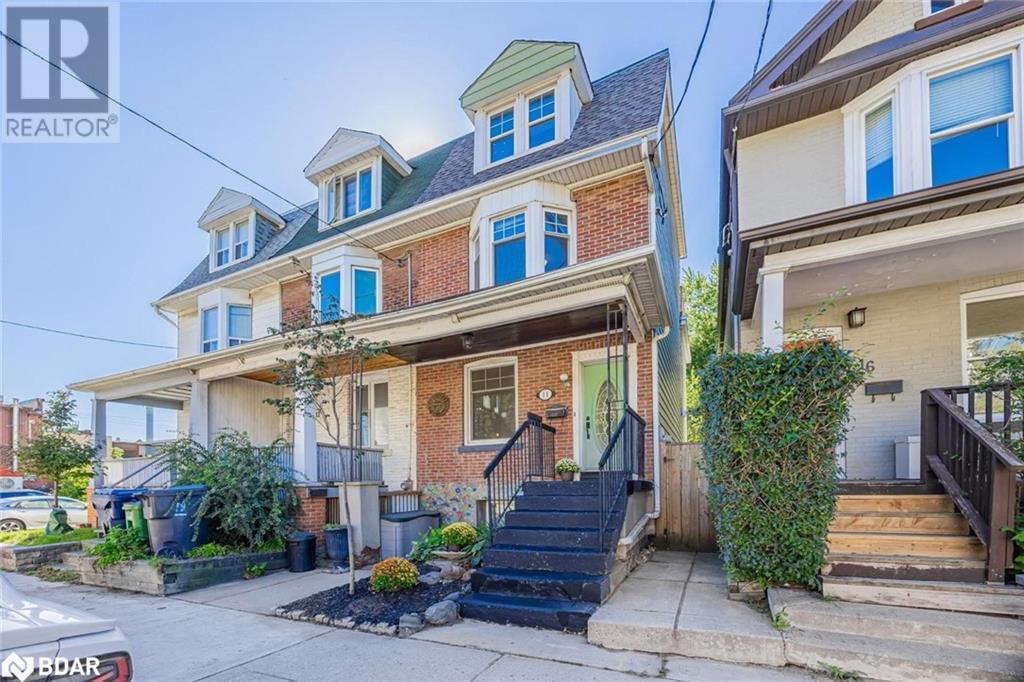 14 Coxwell Avenue, Toronto, Ontario  M4L 3A7 - Photo 1 - 40711271
