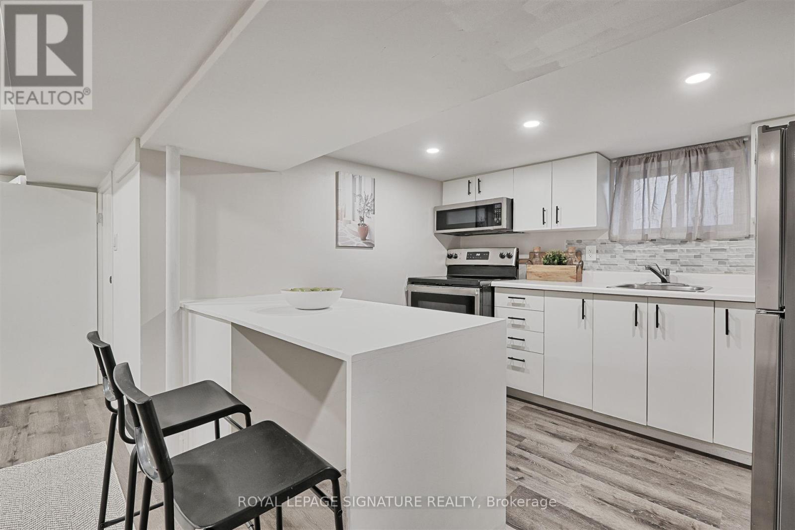 58 Livingstone Avenue, Toronto, Ontario  M6E 2L8 - Photo 30 - W12048809