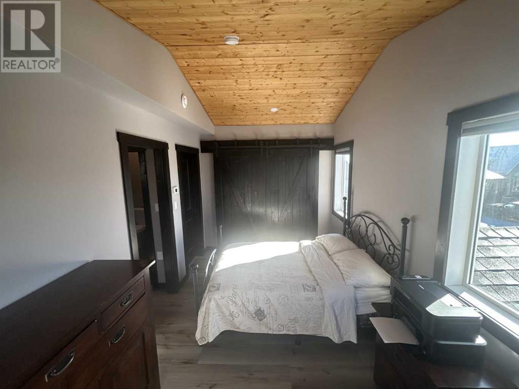 216 Cottageclub Crescent, Rural Rocky View County, Alberta  T4C 1C3 - Photo 14 - A2204834