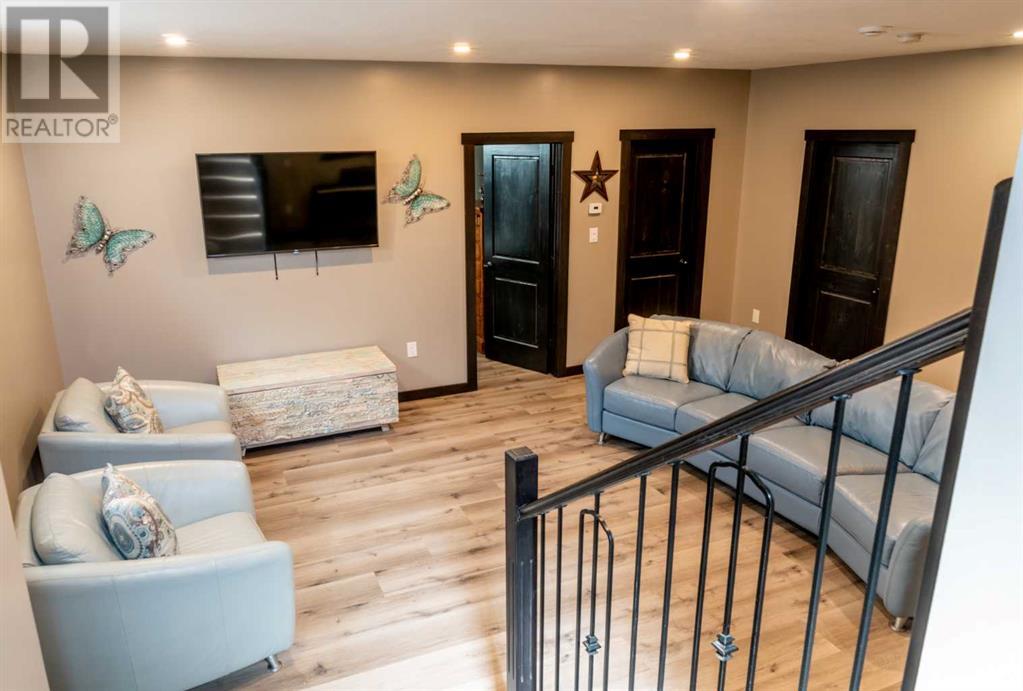 216 Cottageclub Crescent, Rural Rocky View County, Alberta  T4C 1C3 - Photo 17 - A2204834