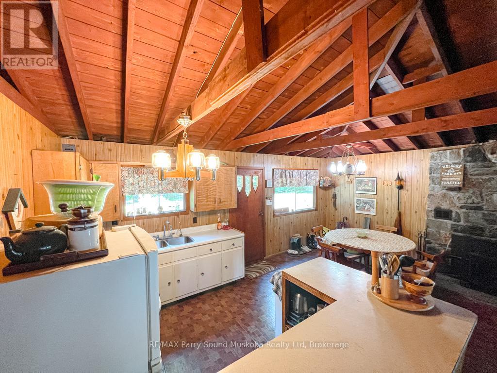 20 Golden Horseshoe Lane, Whitestone, Ontario  P0A 1G0 - Photo 12 - X12053152