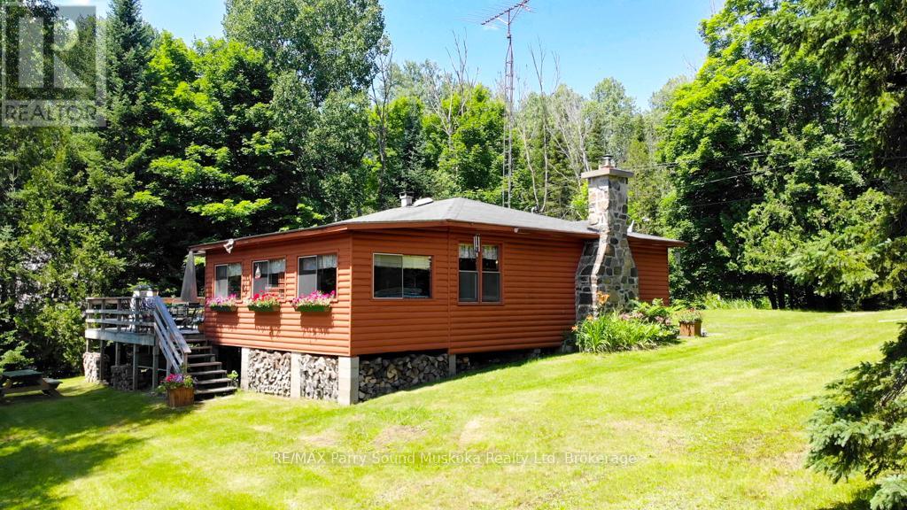 20 Golden Horseshoe Lane, Whitestone, Ontario  P0A 1G0 - Photo 4 - X12053152