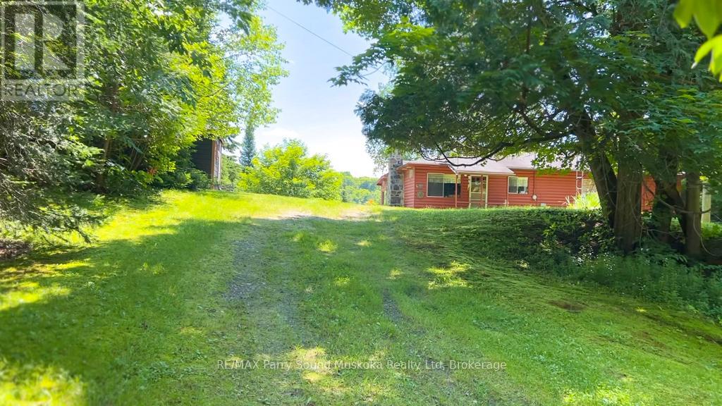 20 Golden Horseshoe Lane, Whitestone, Ontario  P0A 1G0 - Photo 6 - X12053152