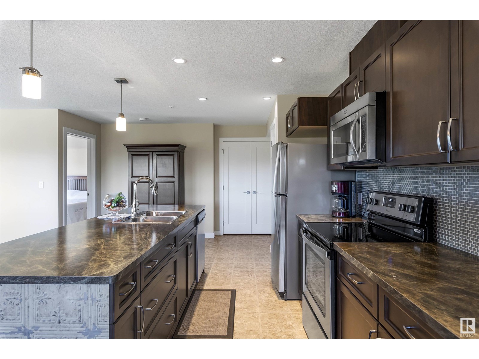 Property at #302 5025 EDGEMONT BV NW image 2