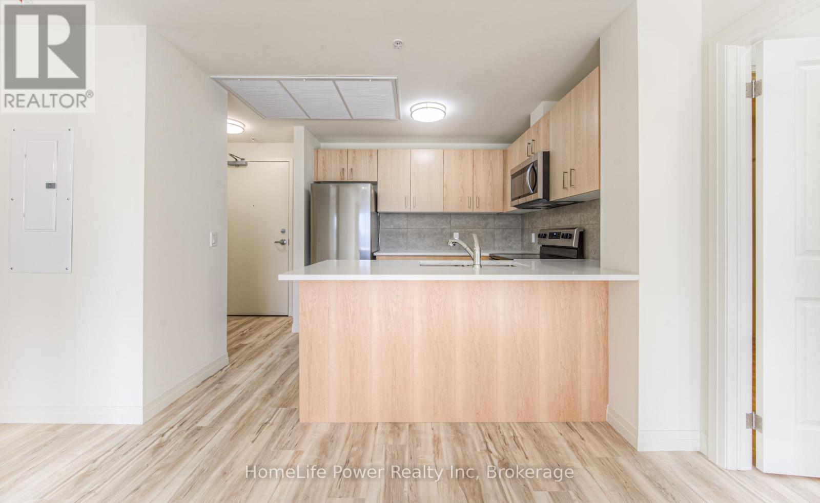 203 - 301 Westmount Road, Kitchener, Ontario  N2M 5M9 - Photo 15 - X12053486