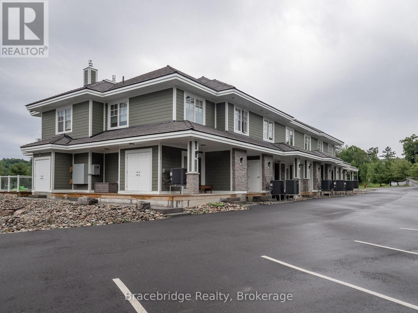 Bhv-B203 - 1869 Muskoka Rd 118 Highway W, Muskoka Lakes, Ontario  P1L 1W8 - Photo 2 - X12053904