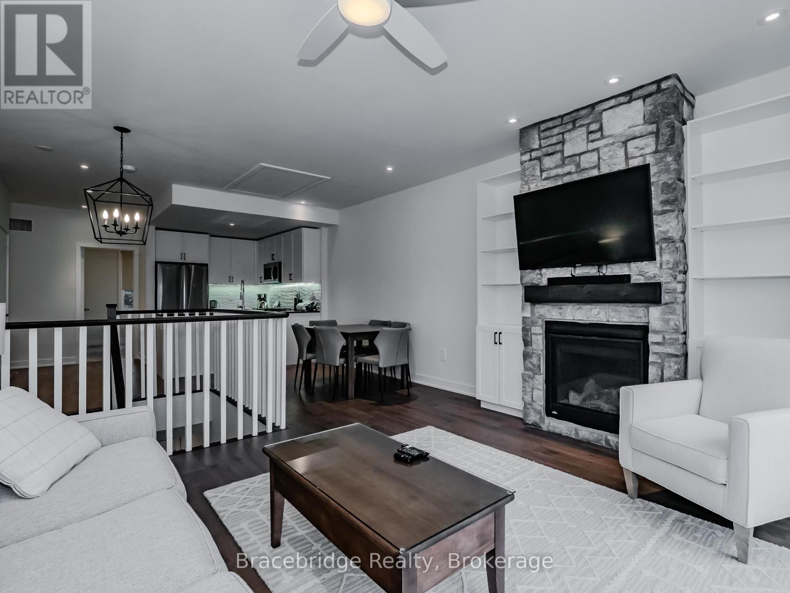 Bhv-B203 - 1869 Muskoka Rd 118 Highway W, Muskoka Lakes, Ontario  P1L 1W8 - Photo 5 - X12053904