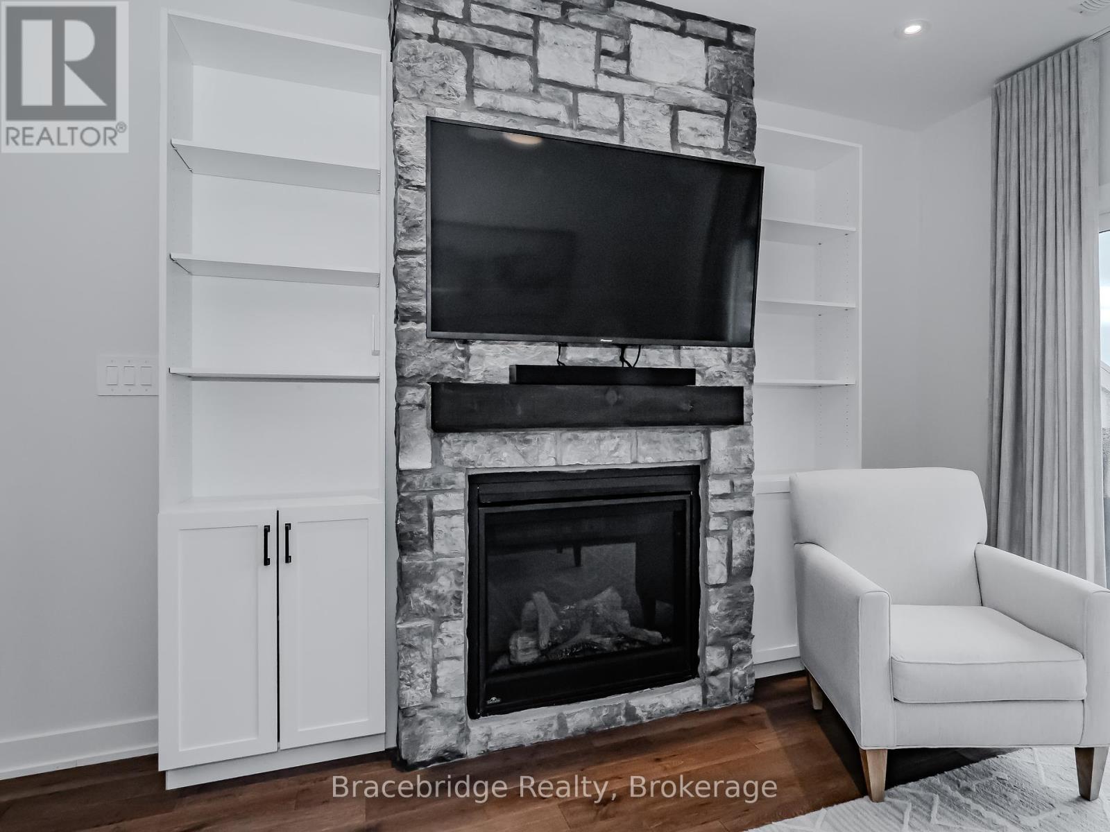 Bhv-B203 - 1869 Muskoka Rd 118 Highway W, Muskoka Lakes, Ontario  P1L 1W8 - Photo 6 - X12053904