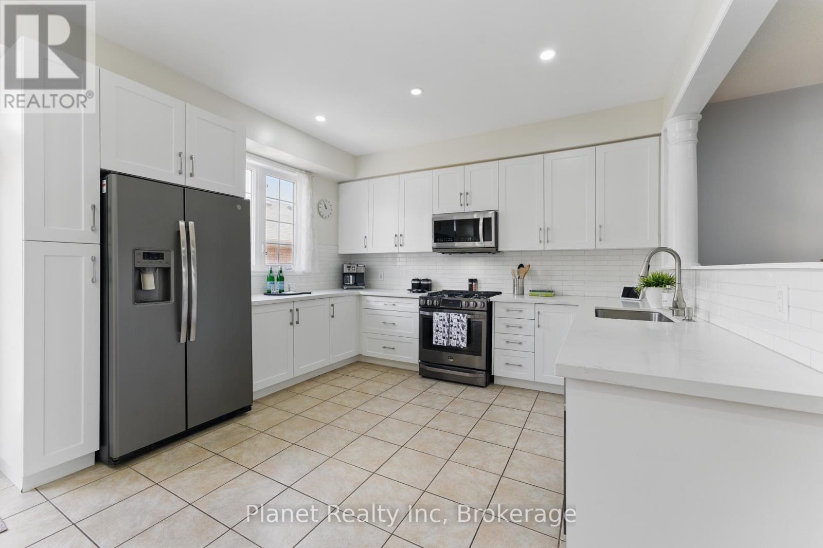 9 - 651 Farmstead Drive, Milton, Ontario  L9T 7W2 - Photo 9 - W12054174