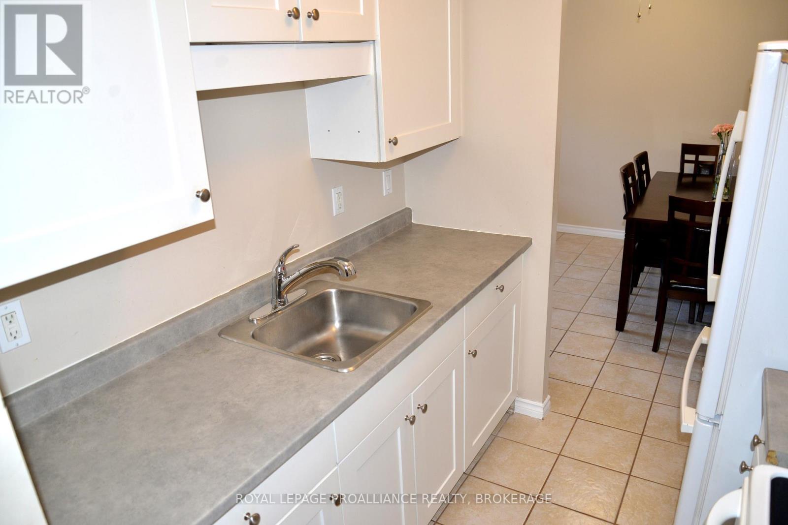 210 - 17 Eldon Hall Place, Kingston, Ontario  K7M 7H5 - Photo 4 - X12054526