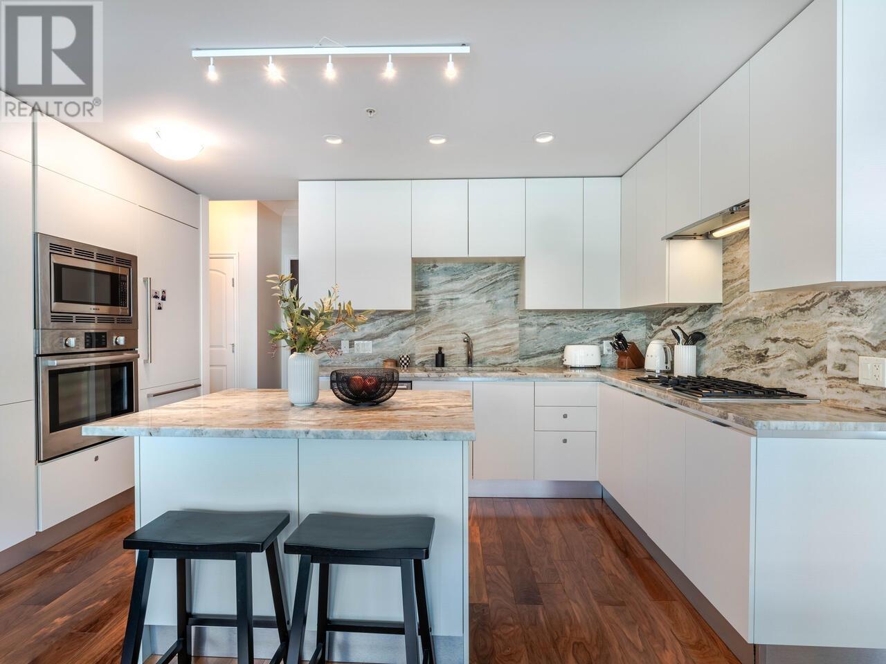604 185 Victory Ship Way, North Vancouver, British Columbia  V7L 0G2 - Photo 2 - R2981901