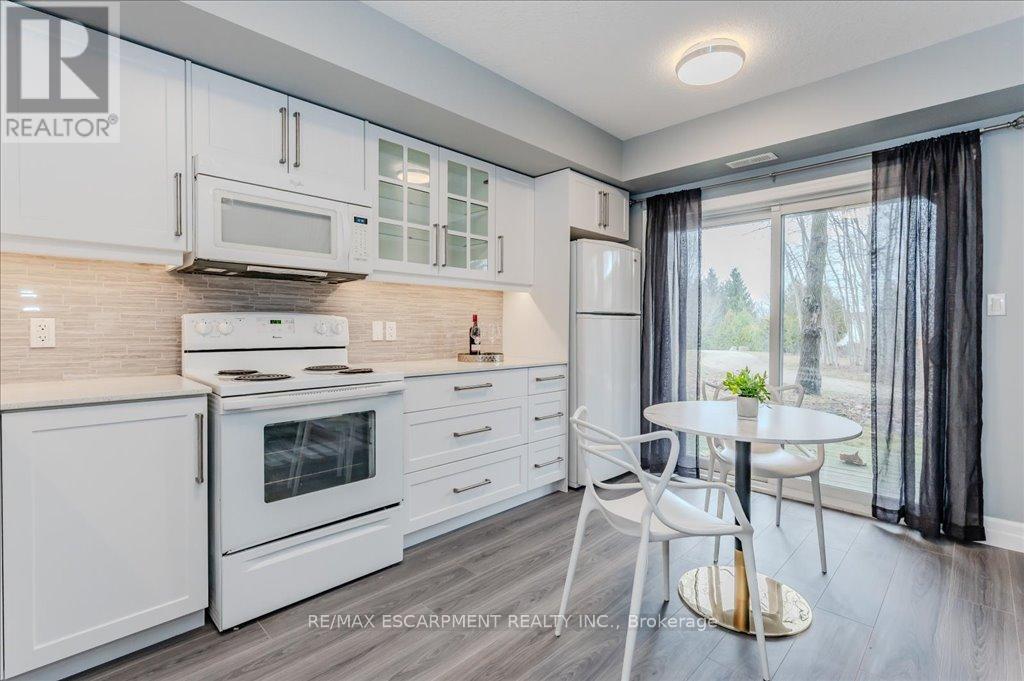 8b - 1180 Countrystone Drive, Kitchener, Ontario  N2N 0B9 - Photo 12 - X12056939