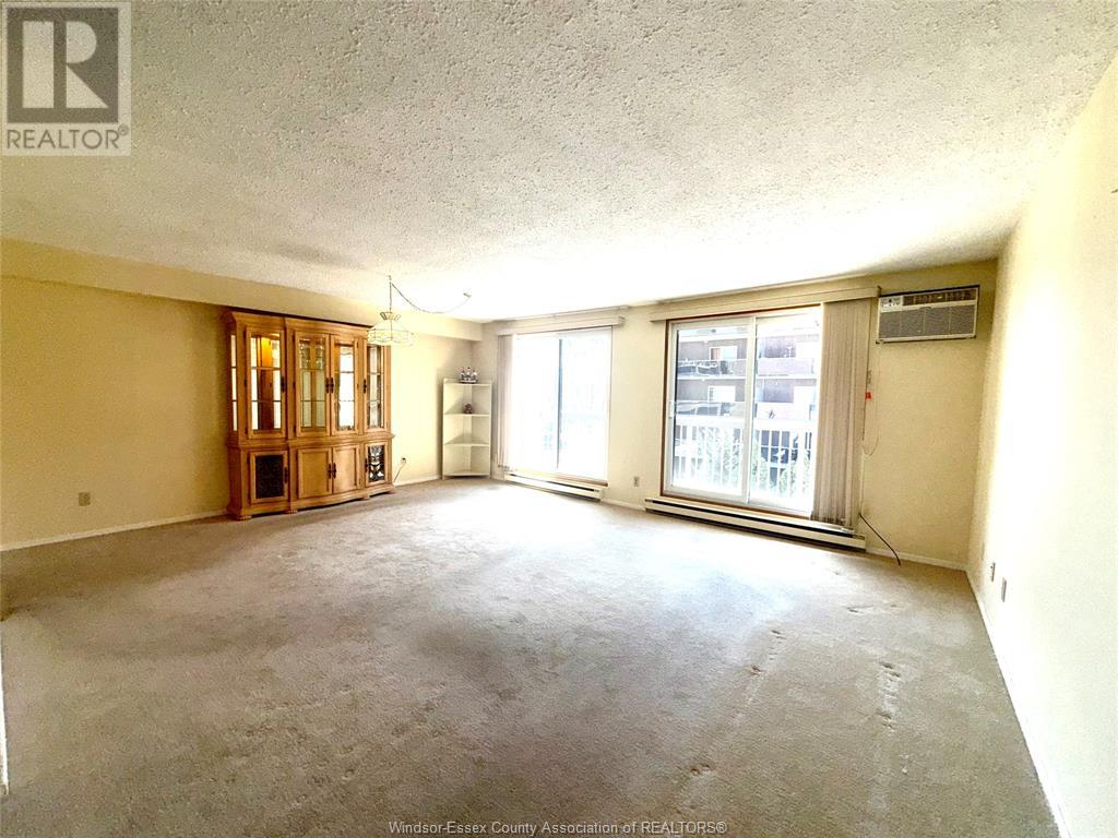 Property at 3936 WYANDOTTE STREET East Unit# 313 image 5