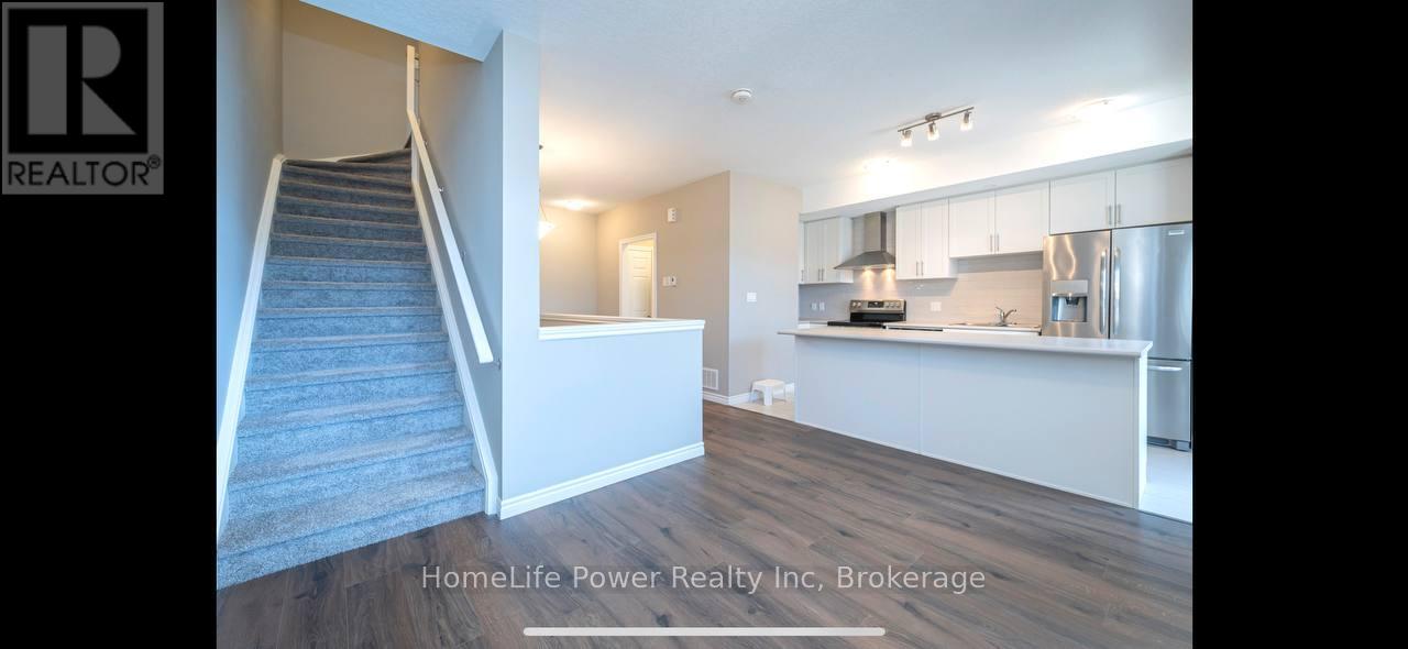 10 Wheat Lane, Kitchener, Ontario  N2R 1R7 - Photo 4 - X12058515