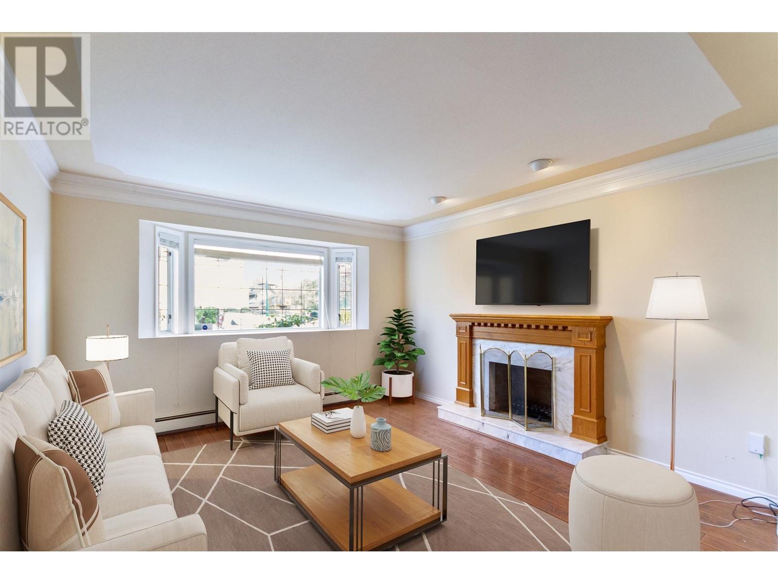 Property at 4586 W 8TH AVENUE image 2