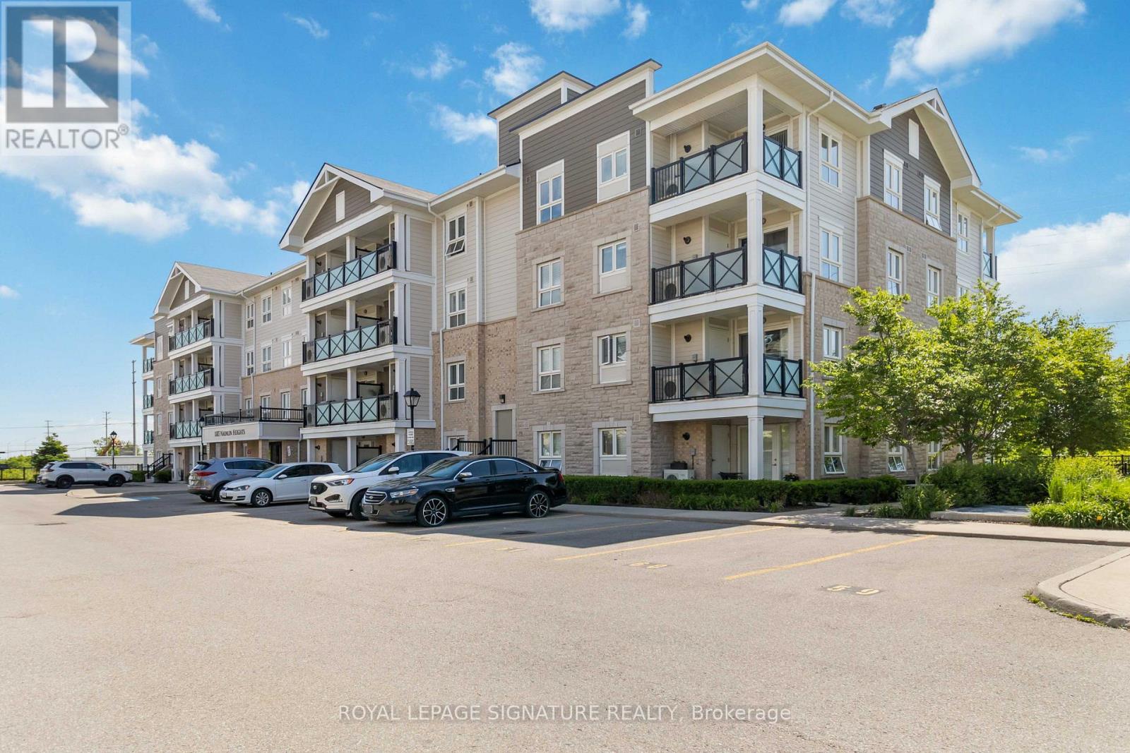 203 - 1005 Nadalin Heights, Milton, Ontario  L9T 8R4 - Photo 3 - W12060113