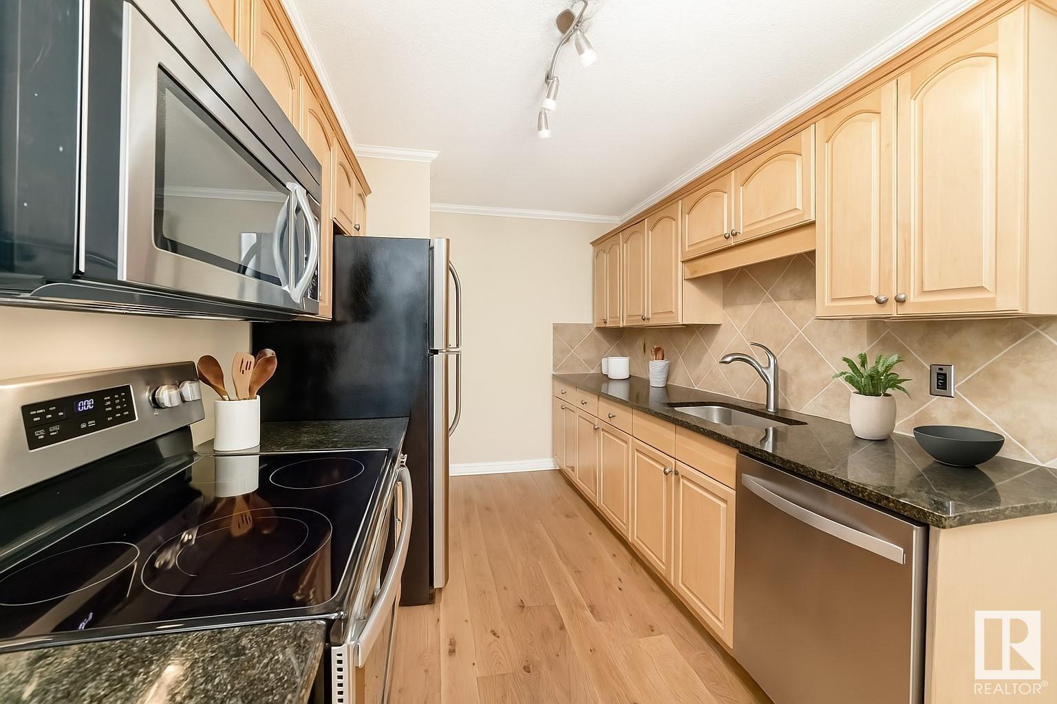 Property at #105 10547 83 AV NW image 2