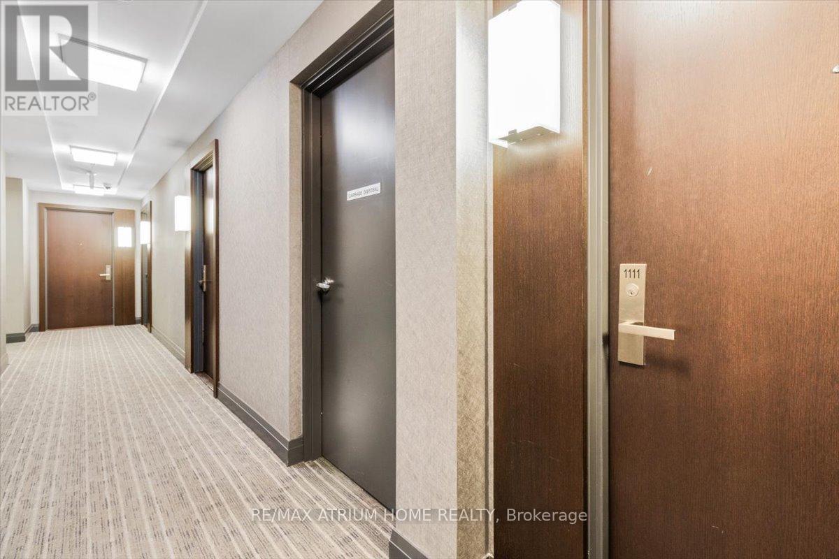 Property at 1111 - 65 SPEERS ROAD image 2