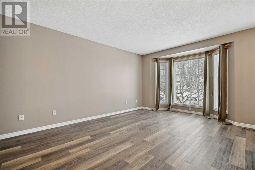 100 Hidden Green Nw, Calgary, Alberta  T3A 5K7 - Photo 6 - A2208641