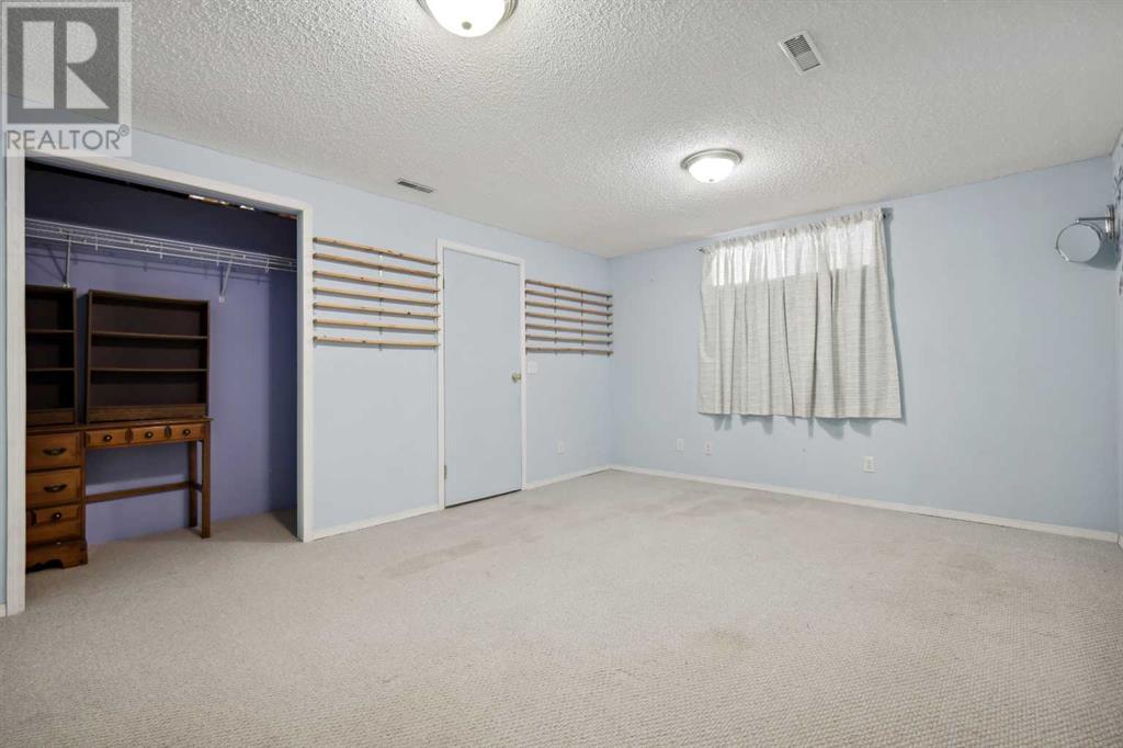 100 Hidden Green Nw, Calgary, Alberta  T3A 5K7 - Photo 40 - A2208641