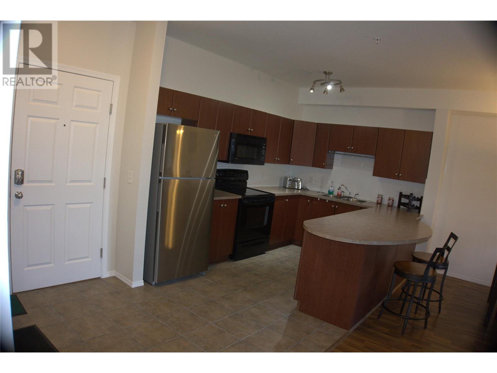 Property at 1875 Country Club Drive Unit# 1318 image 2