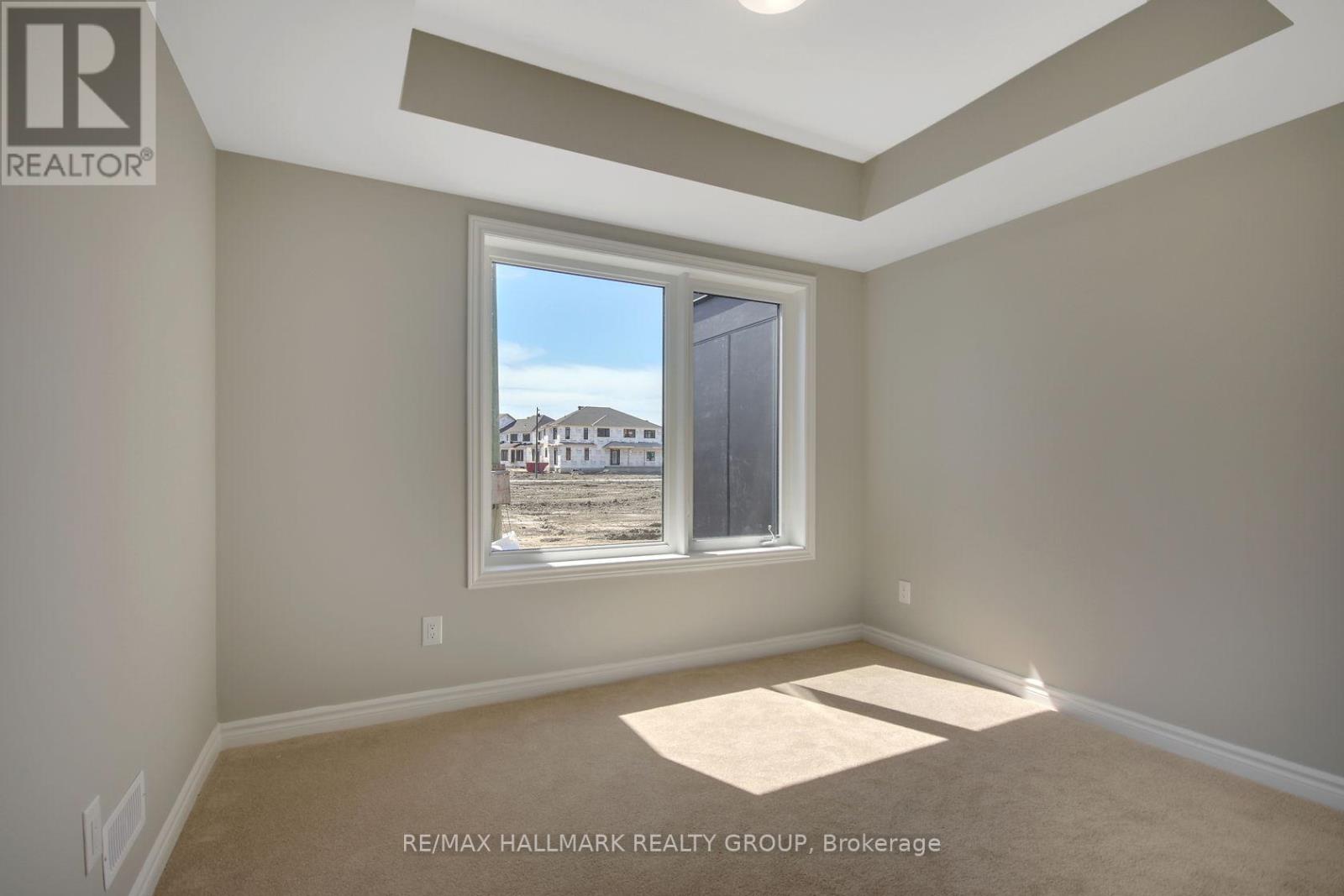 92 Kyanite Lane, Ottawa, Ontario  K2J 7B4 - Photo 5 - X12063306