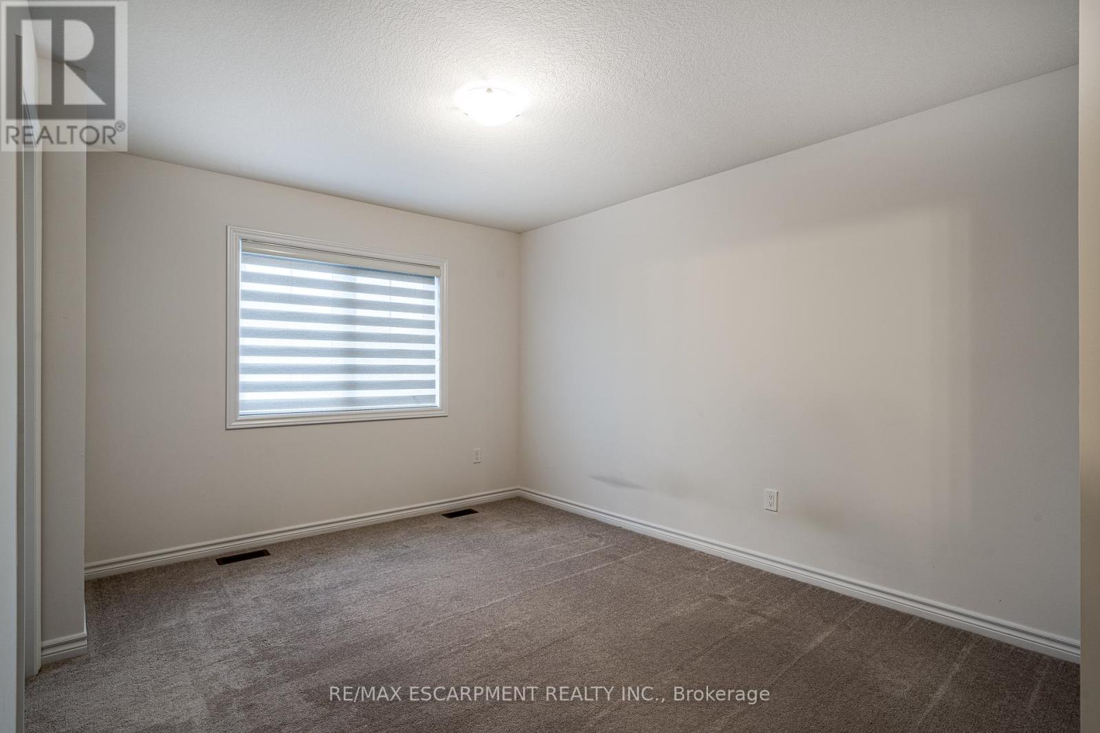 70 Dewberry Drive, Kitchener, Ontario  N2B 0A9 - Photo 12 - X12064470