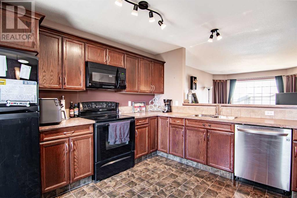 174 Robinson Avenue, Penhold, Alberta  T0M 1R0 - Photo 20 - A2209058