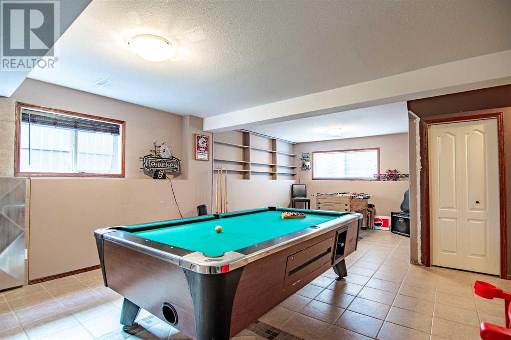 174 Robinson Avenue, Penhold, Alberta  T0M 1R0 - Photo 9 - A2209058