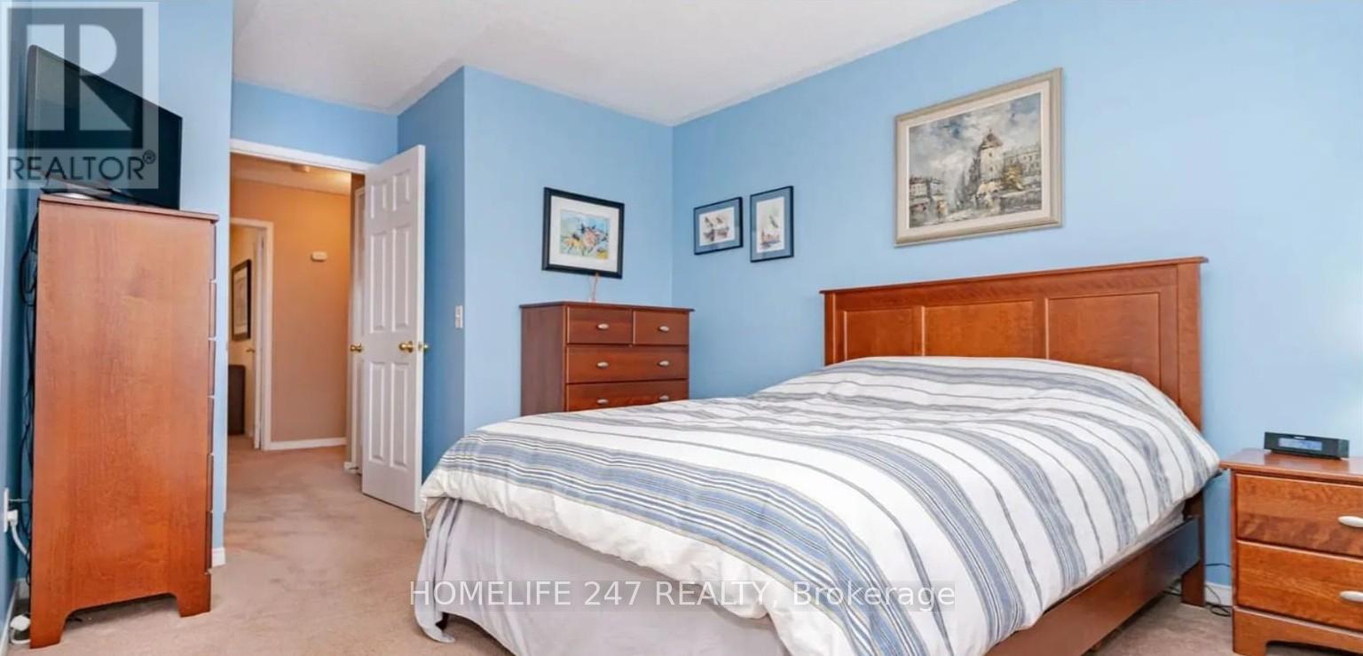 38 - 50 Strathaven Drive, Mississauga, Ontario  L5R 3R9 - Photo 4 - W12064723