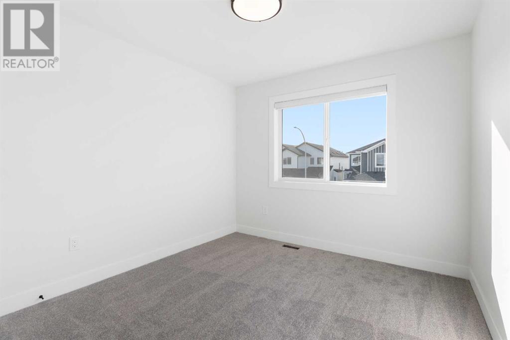 701 Mandalay Link, Carstairs, Alberta  T0M 0N0 - Photo 5 - A2209013