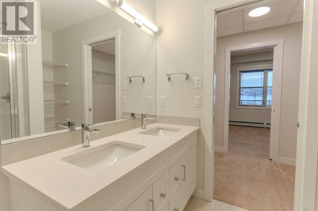 306, 55 Wolf Hollow Crescent Se, Calgary, Alberta  T2X 5W9 - Photo 4 - A2196222