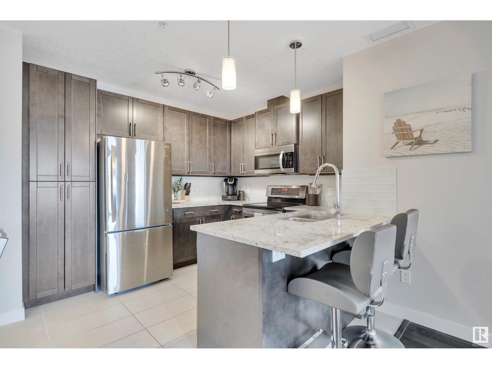 Property at #214 5151 WINDERMERE BV SW image 1