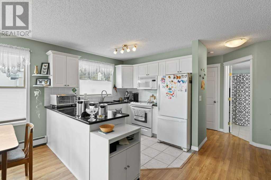 Property at 212, 6900 Hunterview Drive NW image 5
