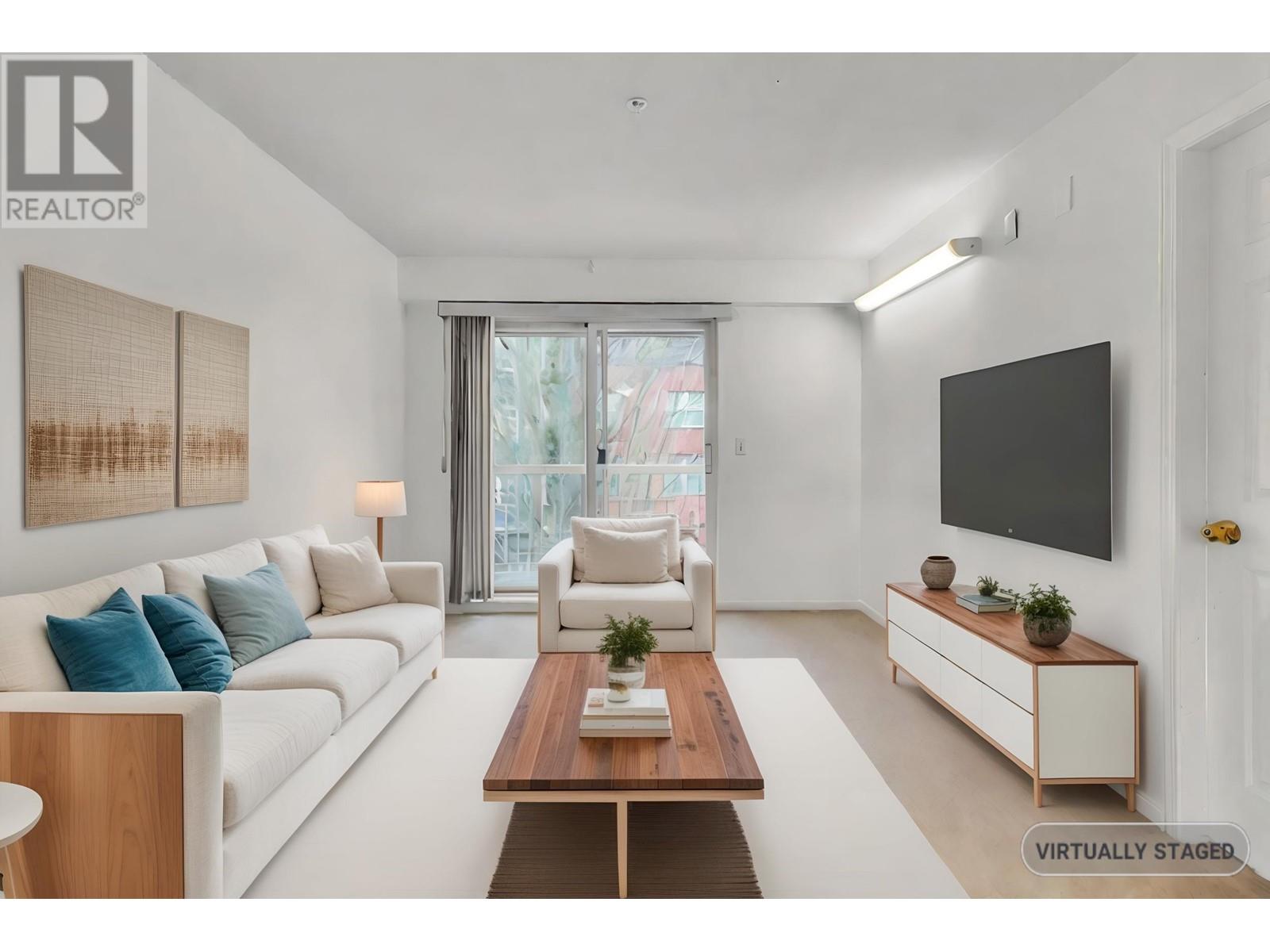 211 3624 Fraser Street, Vancouver, British Columbia  V5V 4C8 - Photo 1 - R2986908