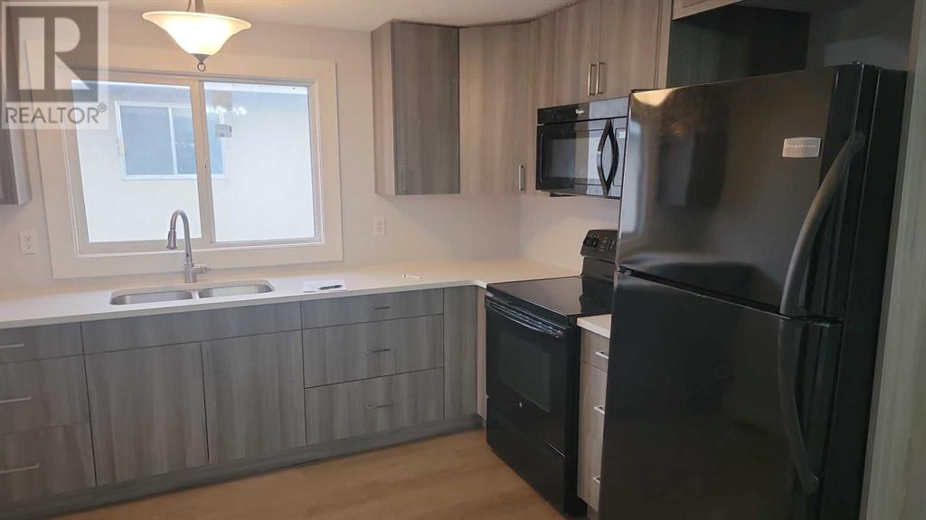 Property at 6054 8 Avenue SE image 3