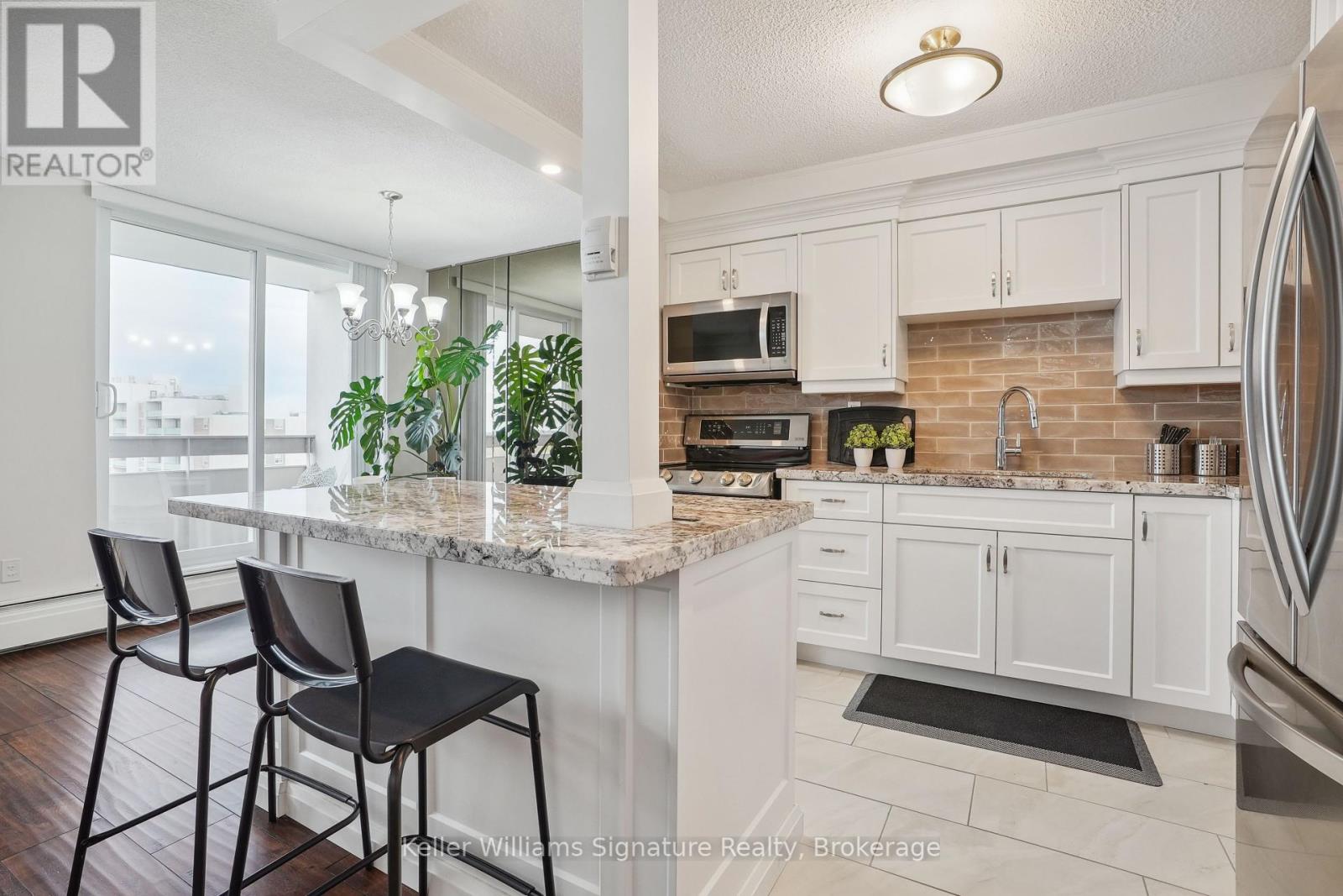 902 - 365 Geneva Street, St. Catharines, Ontario  L2N 5S7 - Photo 1 - X12067669