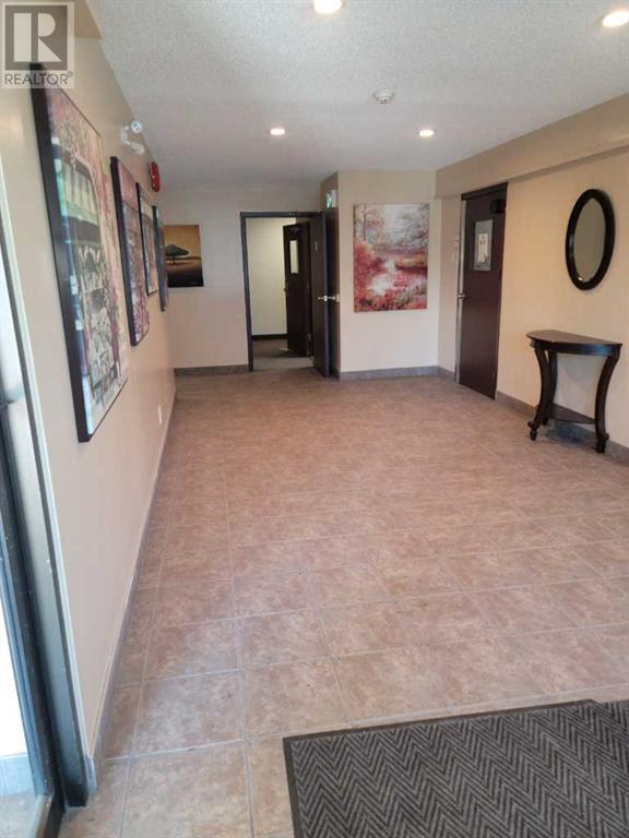 Property at 209, 1712 38 Street SE image 2